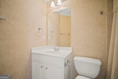 TERRIFIC OPPORTUNITY FOR SAVVY BUYERS IN WOODMONT GOLF AND on Woodmont Golf and Country Club in Georgia - for sale on GolfHomes.com, golf home, golf lot