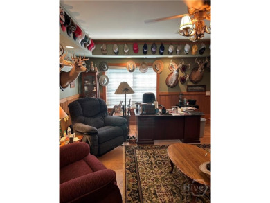 Welcome to this stunning all-brick ranch nestled in a desirable on Monroe Golf and Country Club in Georgia - for sale on GolfHomes.com, golf home, golf lot