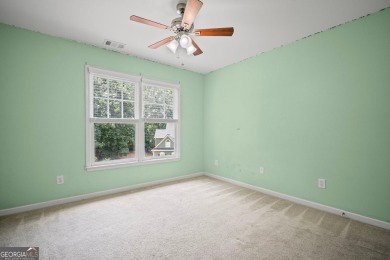 TERRIFIC OPPORTUNITY FOR SAVVY BUYERS IN WOODMONT GOLF AND on Woodmont Golf and Country Club in Georgia - for sale on GolfHomes.com, golf home, golf lot