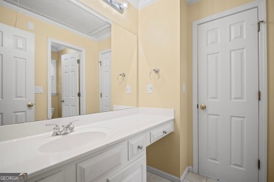 TERRIFIC OPPORTUNITY FOR SAVVY BUYERS IN WOODMONT GOLF AND on Woodmont Golf and Country Club in Georgia - for sale on GolfHomes.com, golf home, golf lot