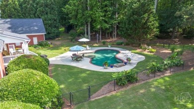 Welcome to this stunning all-brick ranch nestled in a desirable on Monroe Golf and Country Club in Georgia - for sale on GolfHomes.com, golf home, golf lot