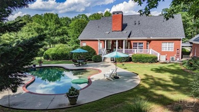 Welcome to this stunning all-brick ranch nestled in a desirable on Monroe Golf and Country Club in Georgia - for sale on GolfHomes.com, golf home, golf lot