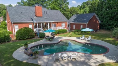 Welcome to this stunning all-brick ranch nestled in a desirable on Monroe Golf and Country Club in Georgia - for sale on GolfHomes.com, golf home, golf lot