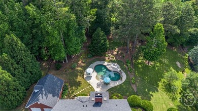 Welcome to this stunning all-brick ranch nestled in a desirable on Monroe Golf and Country Club in Georgia - for sale on GolfHomes.com, golf home, golf lot