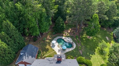 Welcome to this stunning all-brick ranch nestled in a desirable on Monroe Golf and Country Club in Georgia - for sale on GolfHomes.com, golf home, golf lot