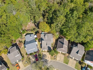 Lakeview Cottage Retreat on Wooded Lot Overlooking a Flowing on The Highlands Course at Lake Arrowhead in Georgia - for sale on GolfHomes.com, golf home, golf lot