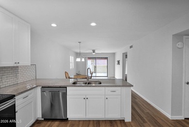 Welcome home to effortless living in Fountain of the Sun, a on Fountain of the Sun Country Club in Arizona - for sale on GolfHomes.com, golf home, golf lot