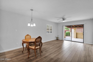 Welcome home to effortless living in Fountain of the Sun, a on Fountain of the Sun Country Club in Arizona - for sale on GolfHomes.com, golf home, golf lot