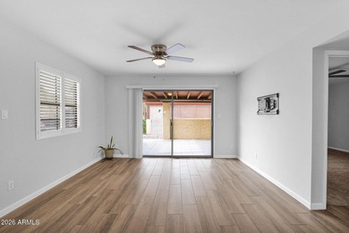 Welcome home to effortless living in Fountain of the Sun, a on Fountain of the Sun Country Club in Arizona - for sale on GolfHomes.com, golf home, golf lot