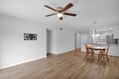 Welcome home to effortless living in Fountain of the Sun, a on Fountain of the Sun Country Club in Arizona - for sale on GolfHomes.com, golf home, golf lot