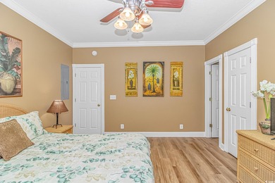 This LAKE FRONT 5 bedroom 3.5  bath raised beach house with on Prestwick Country Club in South Carolina - for sale on GolfHomes.com, golf home, golf lot