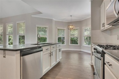 Spacious home nestled in the sought-after Bridgemill community on Bridgemill Golf Club in Georgia - for sale on GolfHomes.com, golf home, golf lot