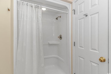 This LAKE FRONT 5 bedroom 3.5  bath raised beach house with on Prestwick Country Club in South Carolina - for sale on GolfHomes.com, golf home, golf lot