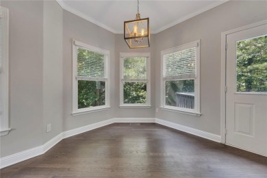 Spacious home nestled in the sought-after Bridgemill community on Bridgemill Golf Club in Georgia - for sale on GolfHomes.com, golf home, golf lot
