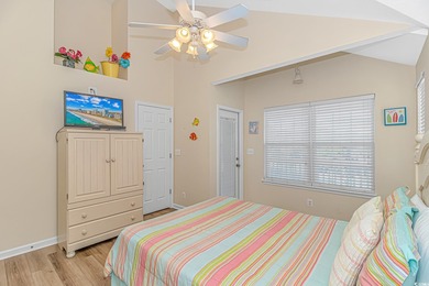 This LAKE FRONT 5 bedroom 3.5  bath raised beach house with on Prestwick Country Club in South Carolina - for sale on GolfHomes.com, golf home, golf lot