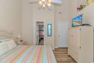 This LAKE FRONT 5 bedroom 3.5  bath raised beach house with on Prestwick Country Club in South Carolina - for sale on GolfHomes.com, golf home, golf lot