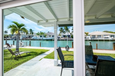 A rare opportunity to own a beautifully maintained piece of on Key Colony Beach Golf Course in Florida - for sale on GolfHomes.com, golf home, golf lot