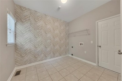 Spacious home nestled in the sought-after Bridgemill community on Bridgemill Golf Club in Georgia - for sale on GolfHomes.com, golf home, golf lot