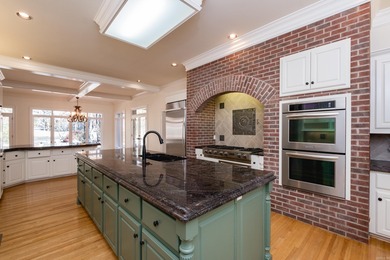 This beautiful CUSTOM home on the prestigious Founder's Course on Chenal Country Club - Bear Den Mountain in Arkansas - for sale on GolfHomes.com, golf home, golf lot