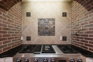 This beautiful CUSTOM home on the prestigious Founder's Course on Chenal Country Club - Bear Den Mountain in Arkansas - for sale on GolfHomes.com, golf home, golf lot