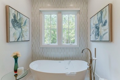 Discover unparalleled luxury and elegance in this brand-new on Reynolds Lake Oconee - The Oconee in Georgia - for sale on GolfHomes.com, golf home, golf lot