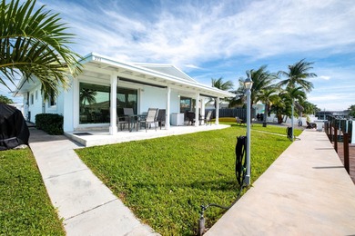 A rare opportunity to own a beautifully maintained piece of on Key Colony Beach Golf Course in Florida - for sale on GolfHomes.com, golf home, golf lot