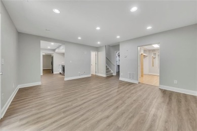 Spacious home nestled in the sought-after Bridgemill community on Bridgemill Golf Club in Georgia - for sale on GolfHomes.com, golf home, golf lot