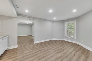 Spacious home nestled in the sought-after Bridgemill community on Bridgemill Golf Club in Georgia - for sale on GolfHomes.com, golf home, golf lot
