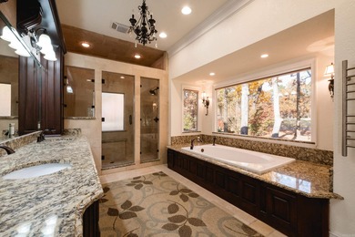 This beautiful CUSTOM home on the prestigious Founder's Course on Chenal Country Club - Bear Den Mountain in Arkansas - for sale on GolfHomes.com, golf home, golf lot