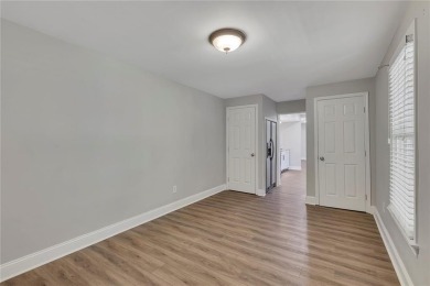Spacious home nestled in the sought-after Bridgemill community on Bridgemill Golf Club in Georgia - for sale on GolfHomes.com, golf home, golf lot