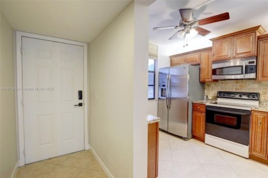 Beautifull 2-bed, 2-bath condo with 1,385 SF of spacious living on Pine Island Ridge Country Club in Florida - for sale on GolfHomes.com, golf home, golf lot