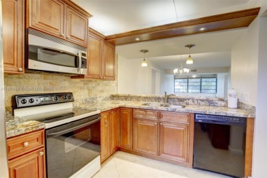 Beautifull 2-bed, 2-bath condo with 1,385 SF of spacious living on Pine Island Ridge Country Club in Florida - for sale on GolfHomes.com, golf home, golf lot