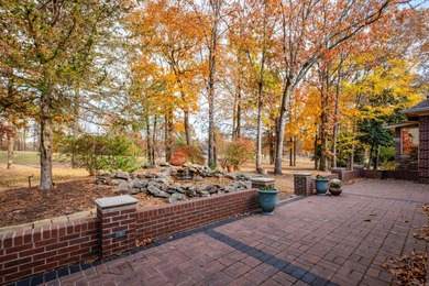 This beautiful CUSTOM home on the prestigious Founder's Course on Chenal Country Club - Bear Den Mountain in Arkansas - for sale on GolfHomes.com, golf home, golf lot