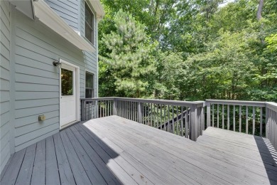 Spacious home nestled in the sought-after Bridgemill community on Bridgemill Golf Club in Georgia - for sale on GolfHomes.com, golf home, golf lot