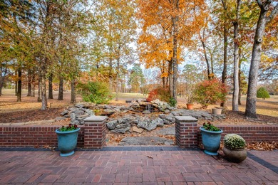 This beautiful CUSTOM home on the prestigious Founder's Course on Chenal Country Club - Bear Den Mountain in Arkansas - for sale on GolfHomes.com, golf home, golf lot