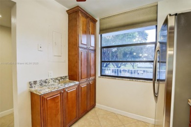 Beautifull 2-bed, 2-bath condo with 1,385 SF of spacious living on Pine Island Ridge Country Club in Florida - for sale on GolfHomes.com, golf home, golf lot