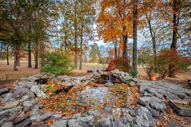 This beautiful CUSTOM home on the prestigious Founder's Course on Chenal Country Club - Bear Den Mountain in Arkansas - for sale on GolfHomes.com, golf home, golf lot