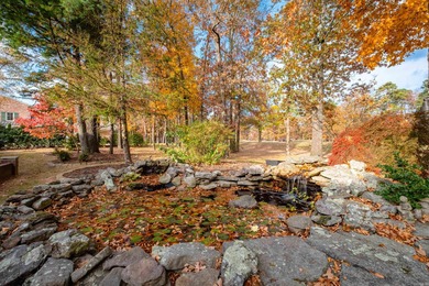 This beautiful CUSTOM home on the prestigious Founder's Course on Chenal Country Club - Bear Den Mountain in Arkansas - for sale on GolfHomes.com, golf home, golf lot