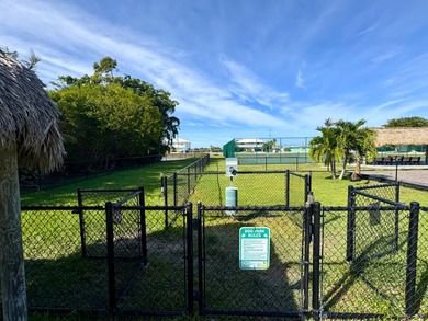 A rare opportunity to own a beautifully maintained piece of on Key Colony Beach Golf Course in Florida - for sale on GolfHomes.com, golf home, golf lot