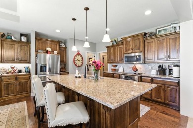 Step into luxury with this stunning reverse 1 1/2 -story home on Prairie Highlands Golf Course in Kansas - for sale on GolfHomes.com, golf home, golf lot