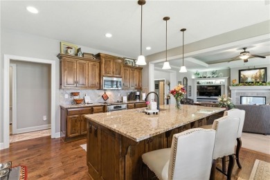 Step into luxury with this stunning reverse 1 1/2 -story home on Prairie Highlands Golf Course in Kansas - for sale on GolfHomes.com, golf home, golf lot