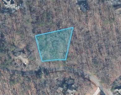 Discover your private woodland retreat with seasonal long-range on The Highlands Course at Lake Arrowhead in Georgia - for sale on GolfHomes.com, golf home, golf lot