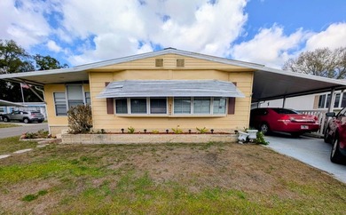 Welcome to easy Florida living in Woodbrook Estates! This on Grasslands Golf and Country Club in Florida - for sale on GolfHomes.com, golf home, golf lot