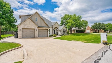 Welcome to your dream custom-built home! This stunning property on De Cordova Bend Country Club in Texas - for sale on GolfHomes.com, golf home, golf lot