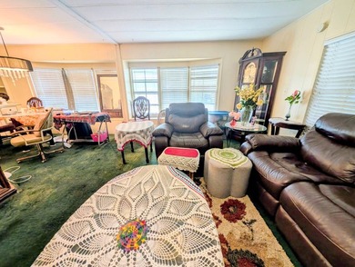 Welcome to easy Florida living in Woodbrook Estates! This on Grasslands Golf and Country Club in Florida - for sale on GolfHomes.com, golf home, golf lot