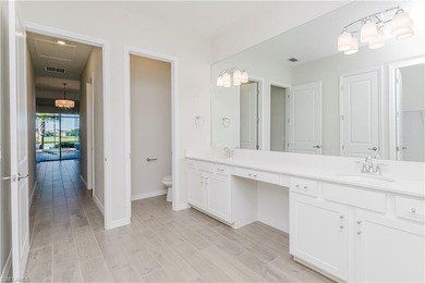 The Lakeside home-- where thoughtful space design and refined on Panther Run Golf Club in Florida - for sale on GolfHomes.com, golf home, golf lot