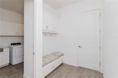 The Lakeside home-- where thoughtful space design and refined on Panther Run Golf Club in Florida - for sale on GolfHomes.com, golf home, golf lot