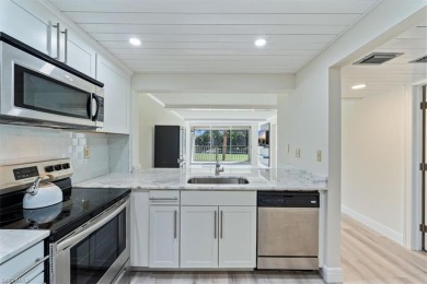 WOW! Fabulously updated 2nd floor unit with a perfect North on Quail Run Golf Club In Naples in Florida - for sale on GolfHomes.com, golf home, golf lot