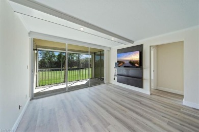 WOW! Fabulously updated 2nd floor unit with a perfect North on Quail Run Golf Club In Naples in Florida - for sale on GolfHomes.com, golf home, golf lot