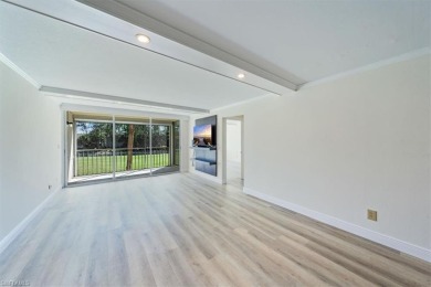 WOW! Fabulously updated 2nd floor unit with a perfect North on Quail Run Golf Club In Naples in Florida - for sale on GolfHomes.com, golf home, golf lot
